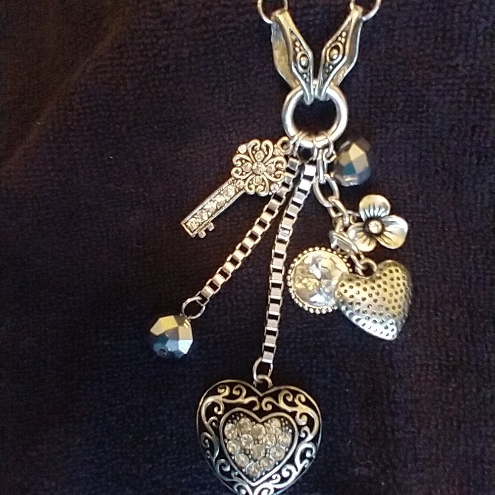 Long dangling 'antique' charm necklace